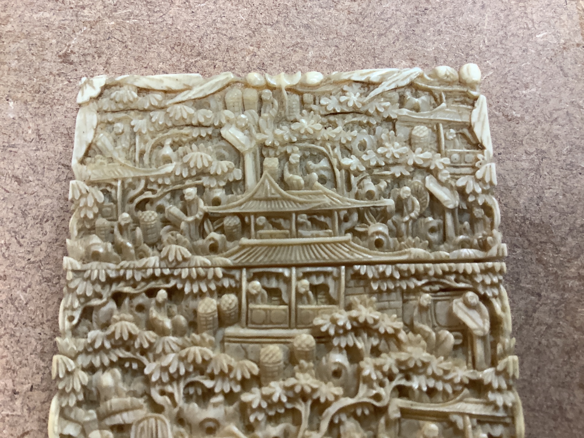 A Chinese Cantonese carved ivory card case, 11.5cm